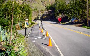 Survey crew at work near Monterey for Caltrans District 59.